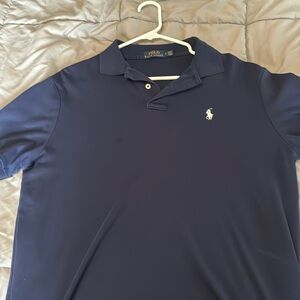 Ralph Lauren Polo size medium. Navy blue with white logo in EUC.